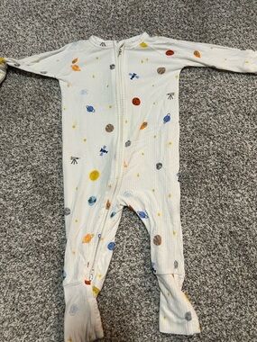 Brave little ones One-Piece Zip Footed Romper in White with Space Print